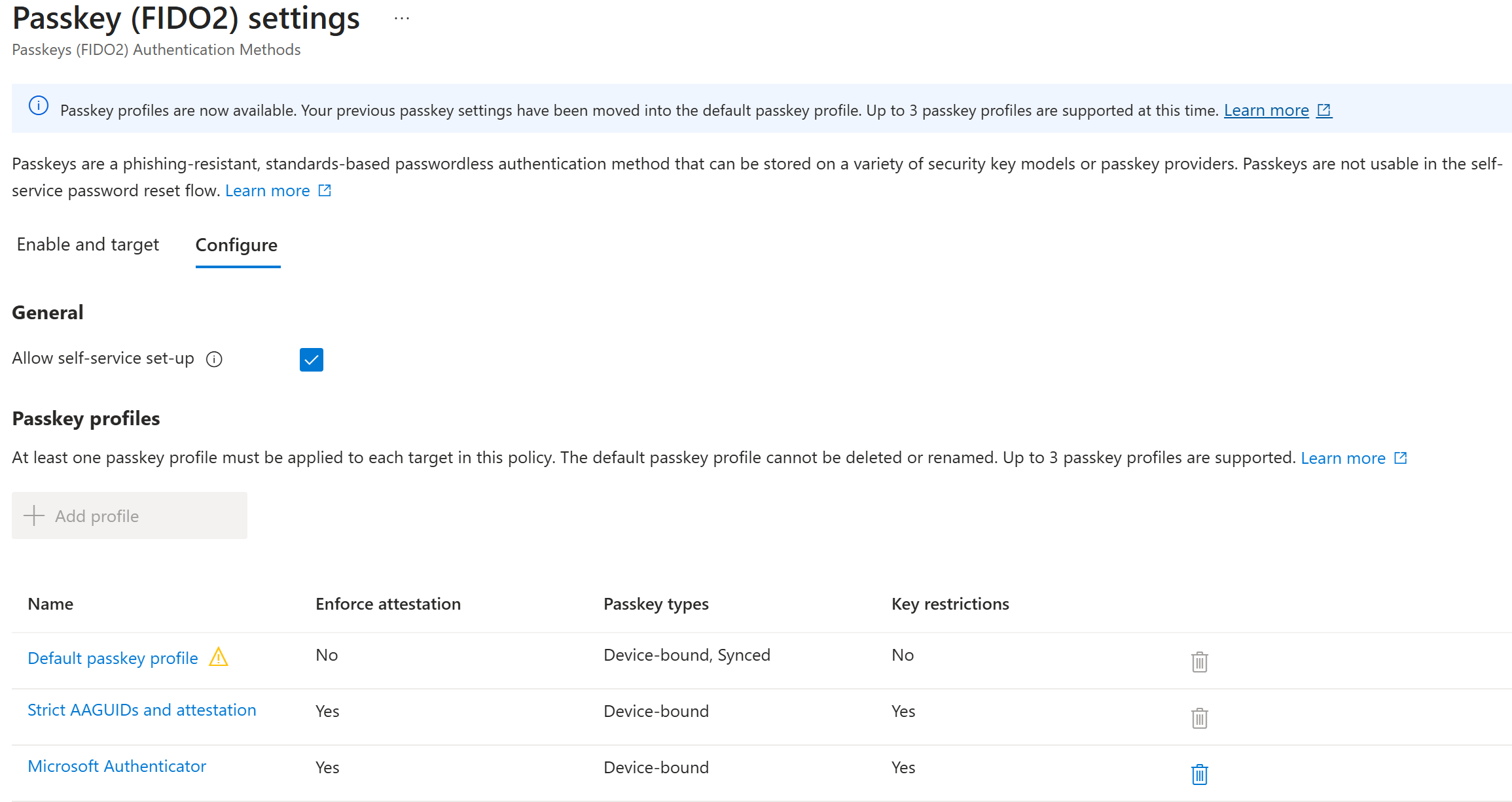 Passkey profiles Configure tab showing self-service toggle and three profiles with their attestation, passkey type, and key restriction settings